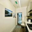 Kitchen at Heathrow Roomzzz BnB