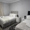 Quad room at Heathrow Roomzzz BnB