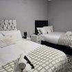 Quad room at Heathrow Roomzzz BnB