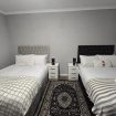 Quad room at Heathrow Roomzzz BnB