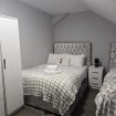 Quad room at Heathrow Roomzzz BnB